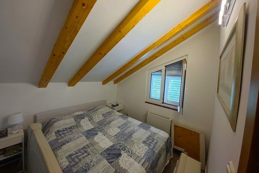Bedroom with double bed in the attic