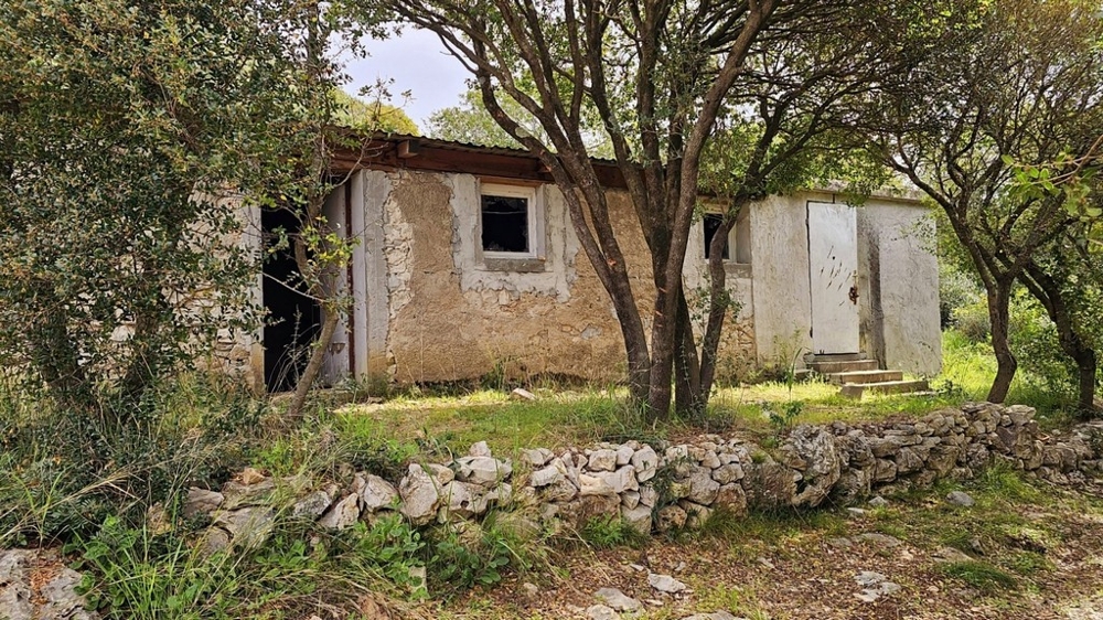 House to rebuild by the sea.