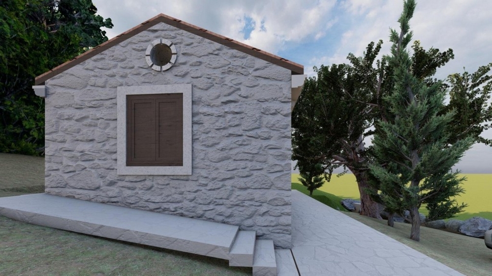 Compact stone house with classic construction and shutters