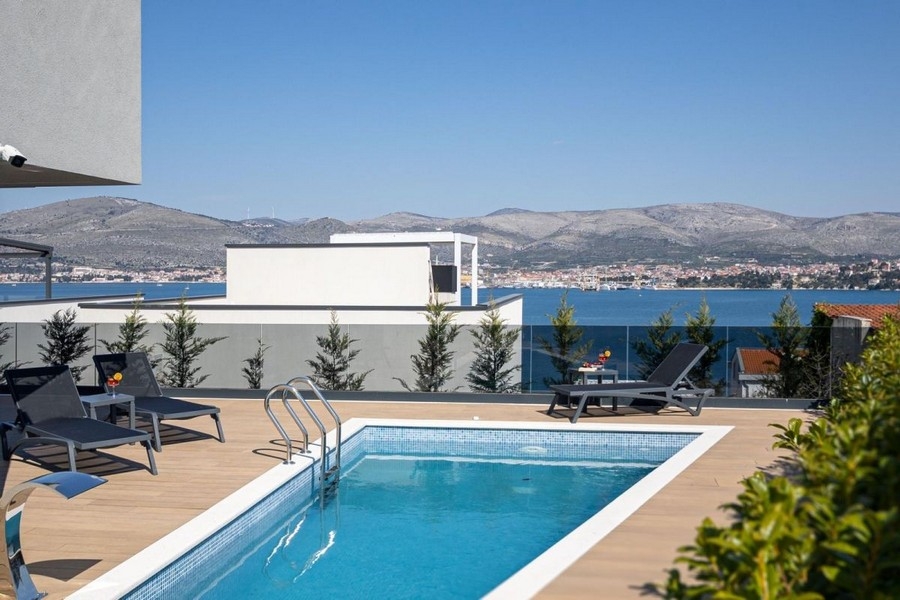 Pool and sea views from the terrace of the terraced house