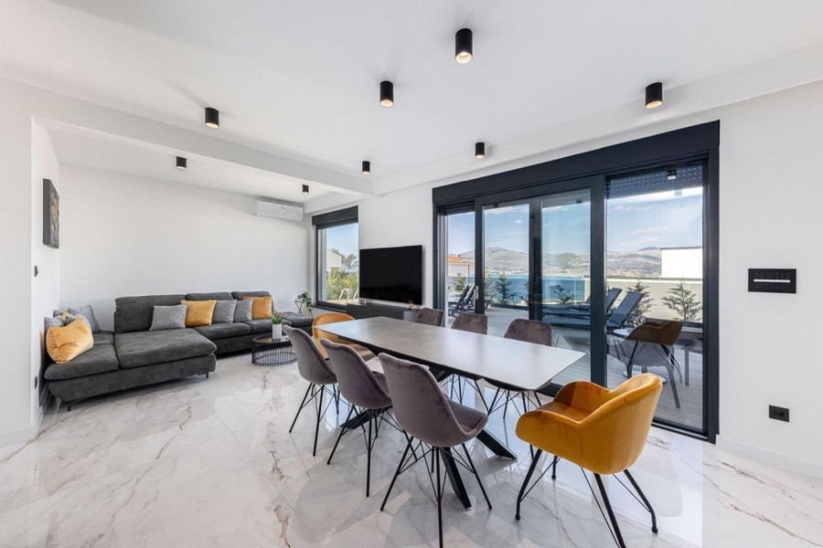 Open living and dining area with modern furnishings