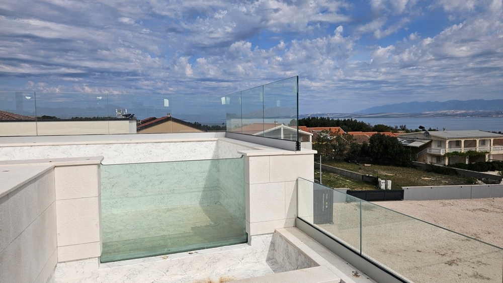 Roof terrace with private pool and glass railings and beautiful sea views of Vir.