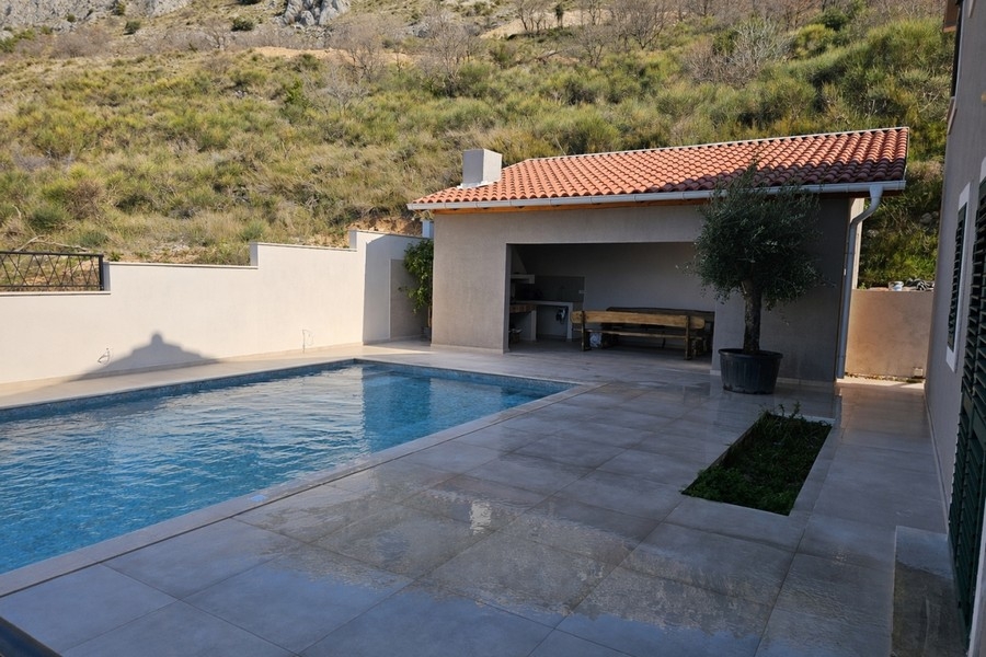 Swimming pool with sun terrace and outdoor area