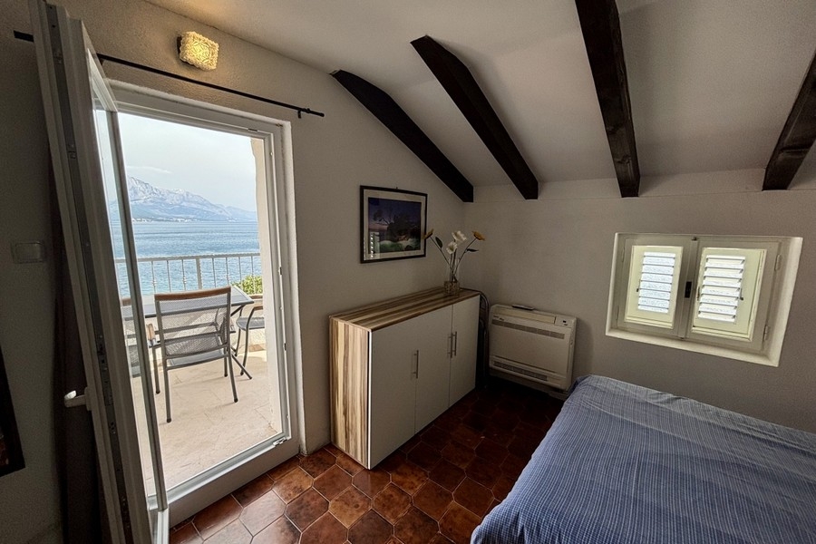 Bedroom with balcony and sea views on the Omis Riviera