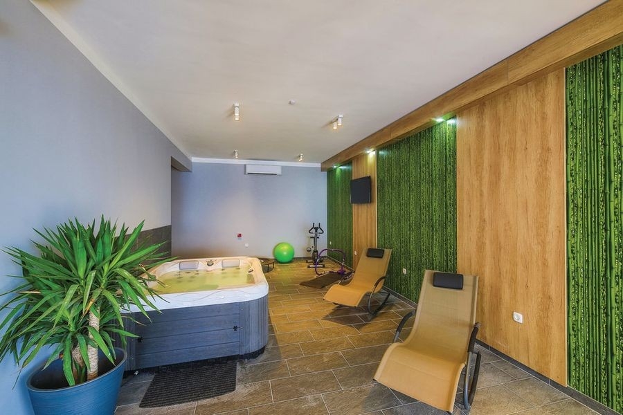 Jacuzzi and wellness room in a modern villa