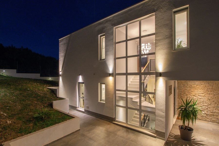 Illuminated luxury villa with a modern design