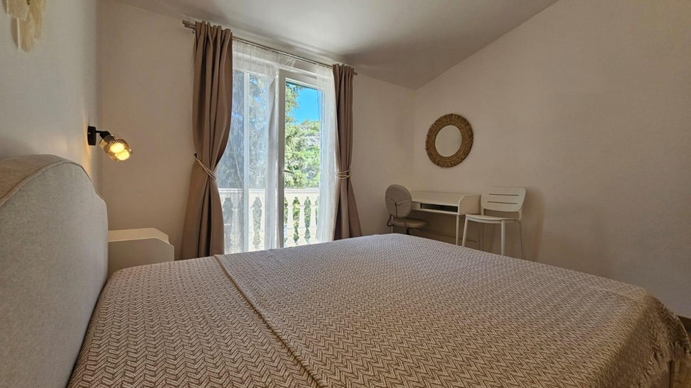 Bright bedroom with balcony