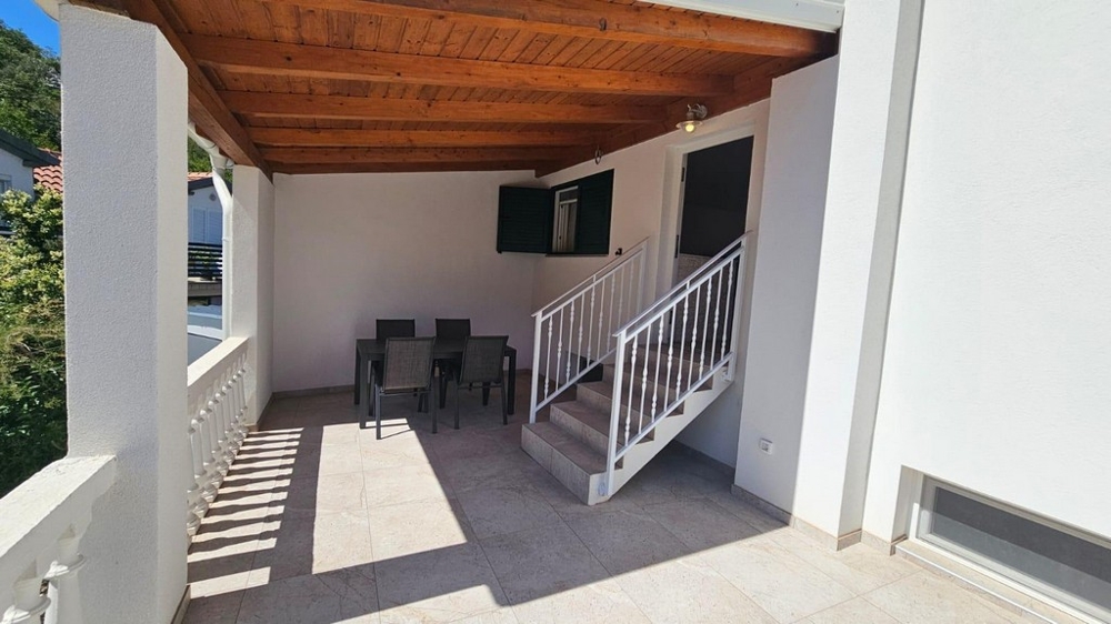 Covered terrace with seating area
