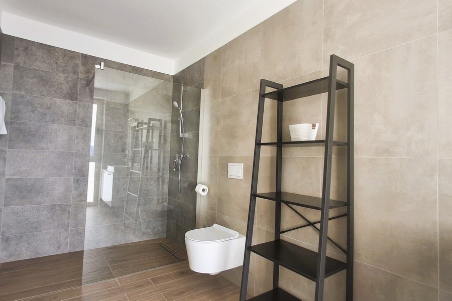 Modern bathroom with floor-level shower