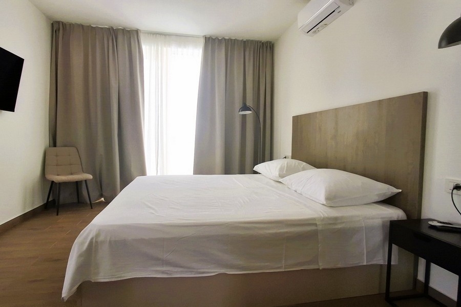 Modern bedroom with air conditioning and high quality furnishings