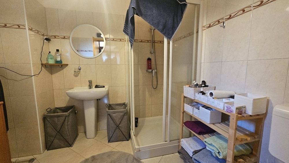 Bathroom with shower in the well-kept interior