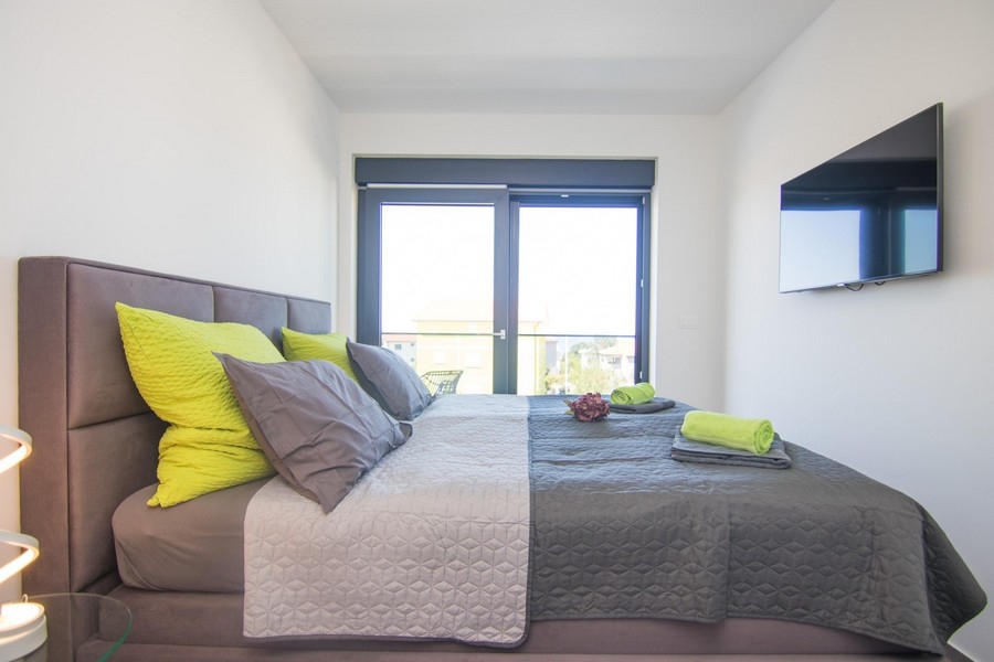 Bedroom with balcony access