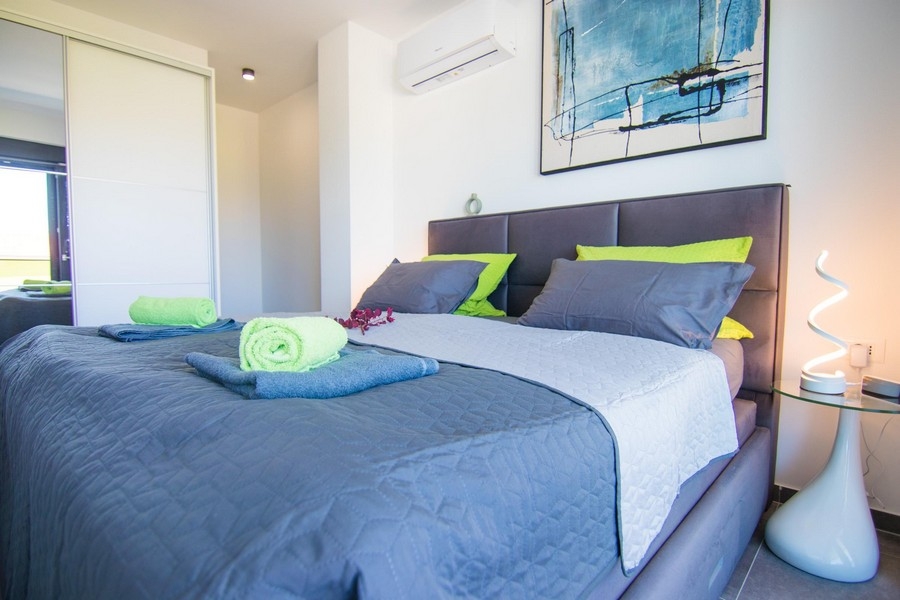 Bright bedroom with air conditioning