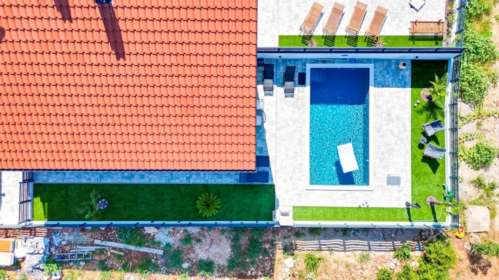 Aerial view of villa with swimming pool