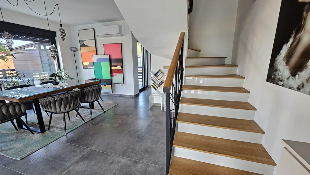 Open living area with stairs
