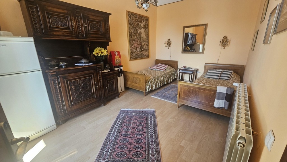 Bedroom with classic wooden furniture