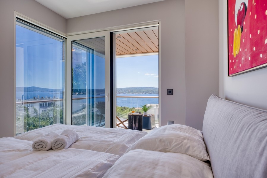 Modern bedroom with terrace and sea view