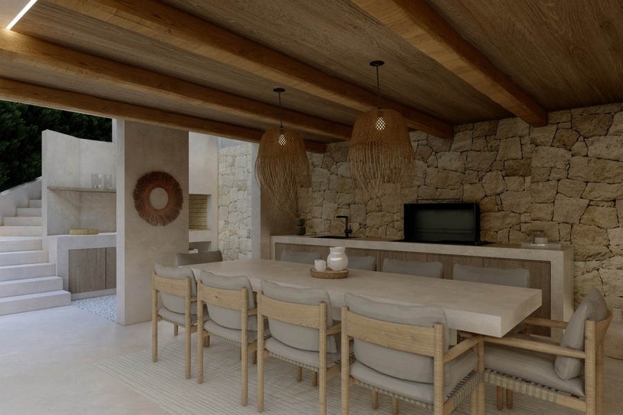 Covered outdoor area with summer kitchen and dining area