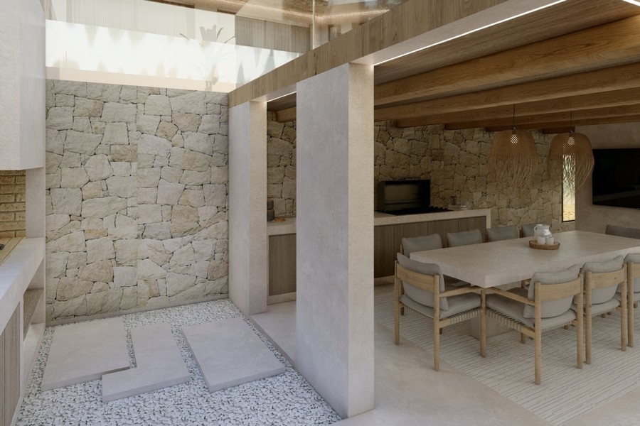 Mediterranean outdoor area with natural stone and lounge area