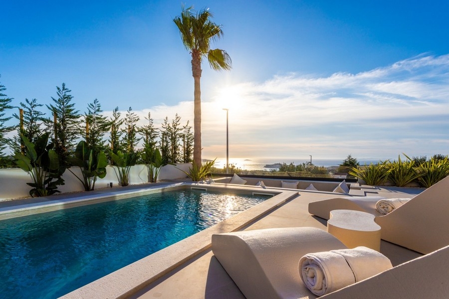 Modern pool area with sea views in luxury villa