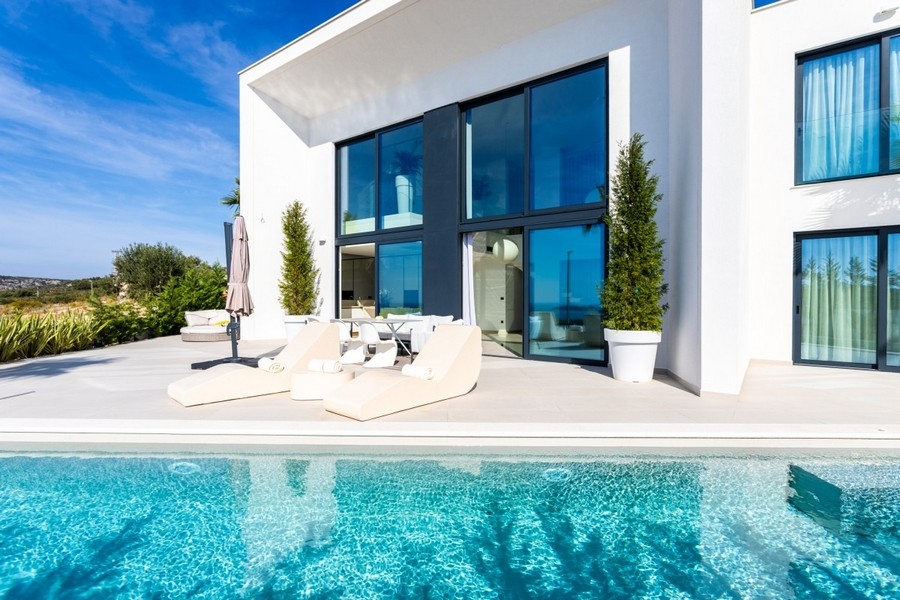 Modern luxury villa with pool and large terrace