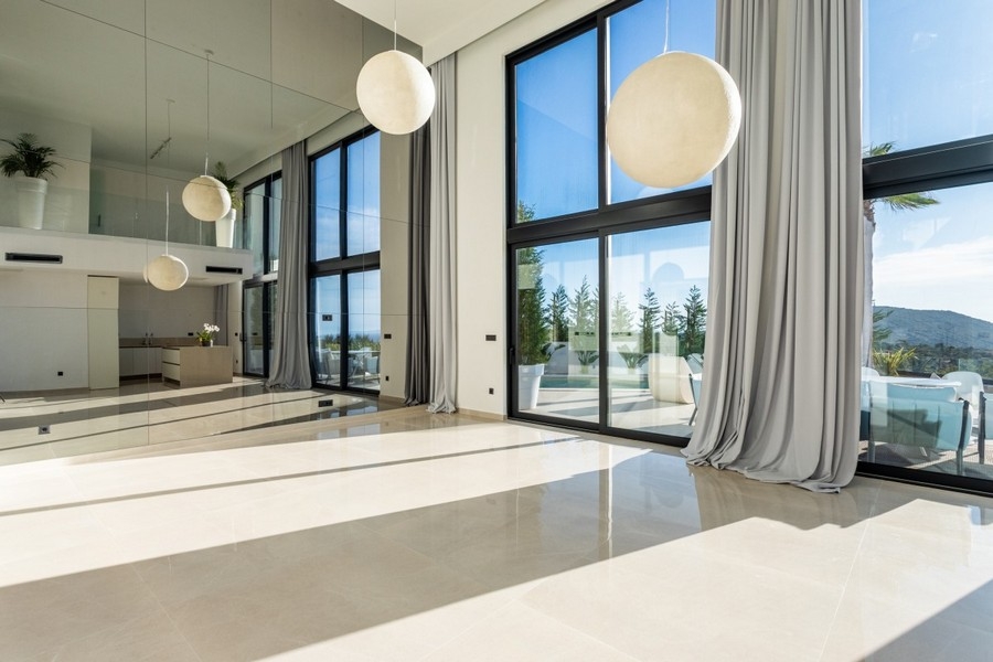 Bright living area with high glass fronts