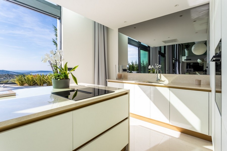 Modern kitchen with sea views and island