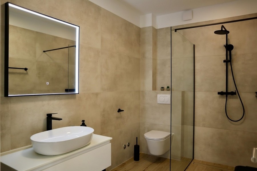 Bright bathroom with floor-level shower