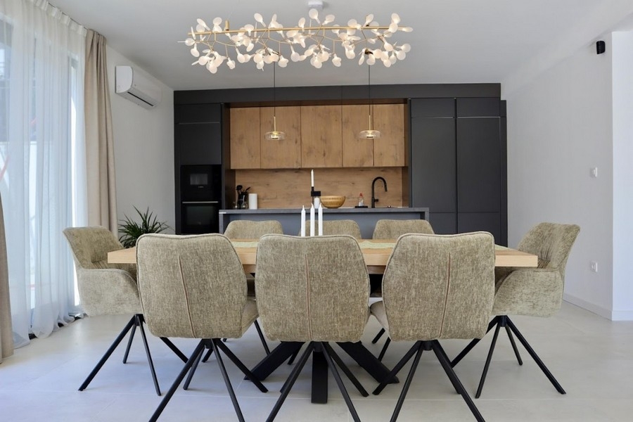 Dining area with designer kitchen and lots of natural light