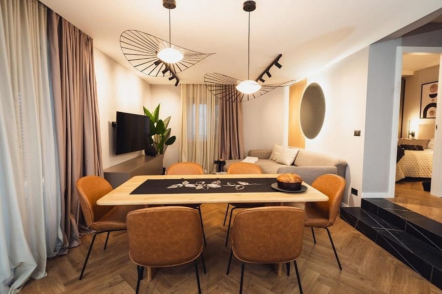 Living and dining area with designer lights