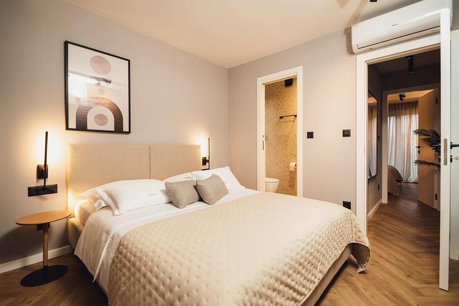 Bedroom with modern bathroom