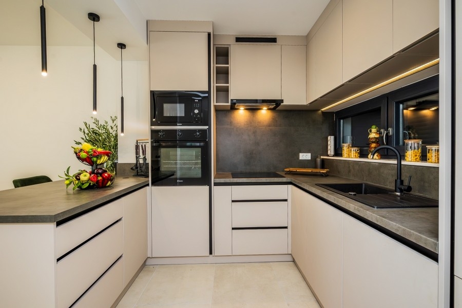 Modern fitted kitchen in villa
