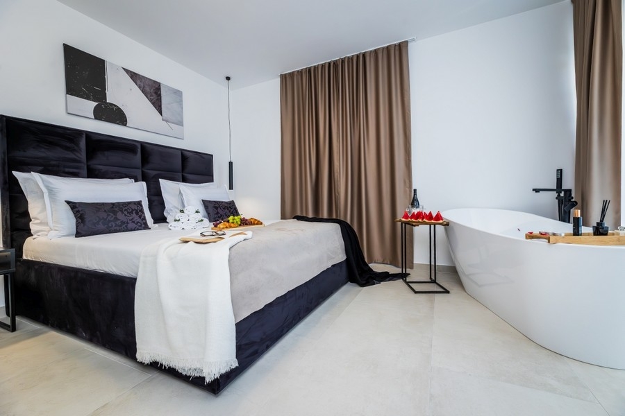 Luxury bedroom with bathtub