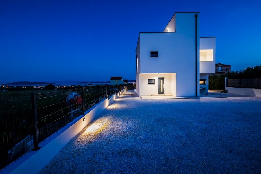 Entrance and exterior view of modern new villa