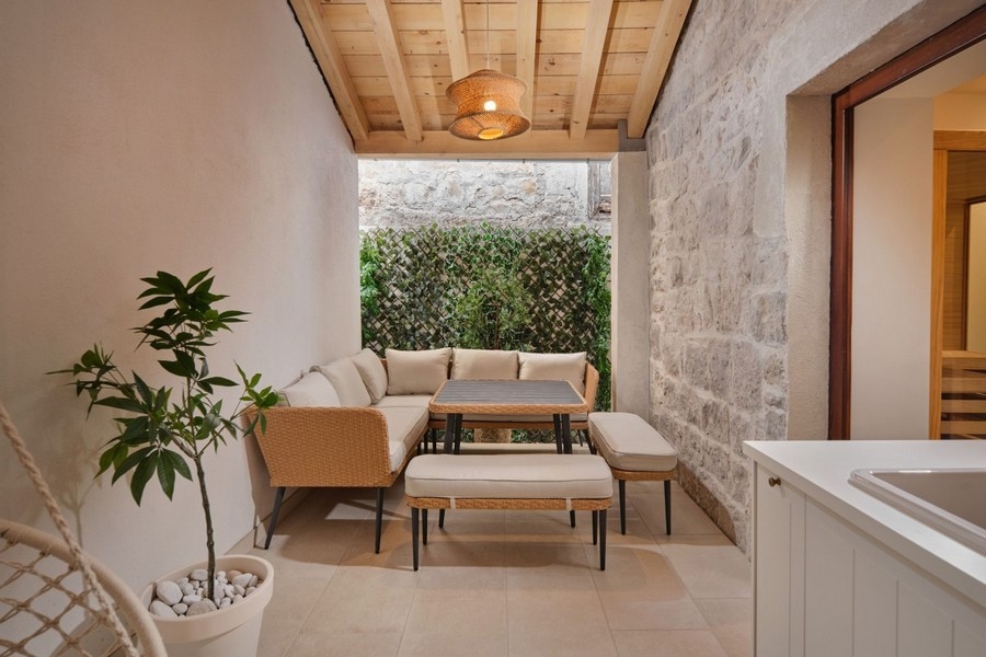 Covered terrace with seating area