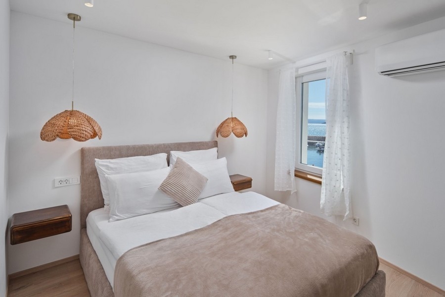 Modern bedroom with sea views