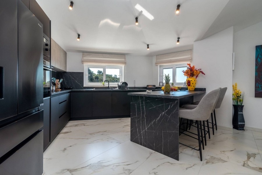 High-quality fitted kitchen with seating area