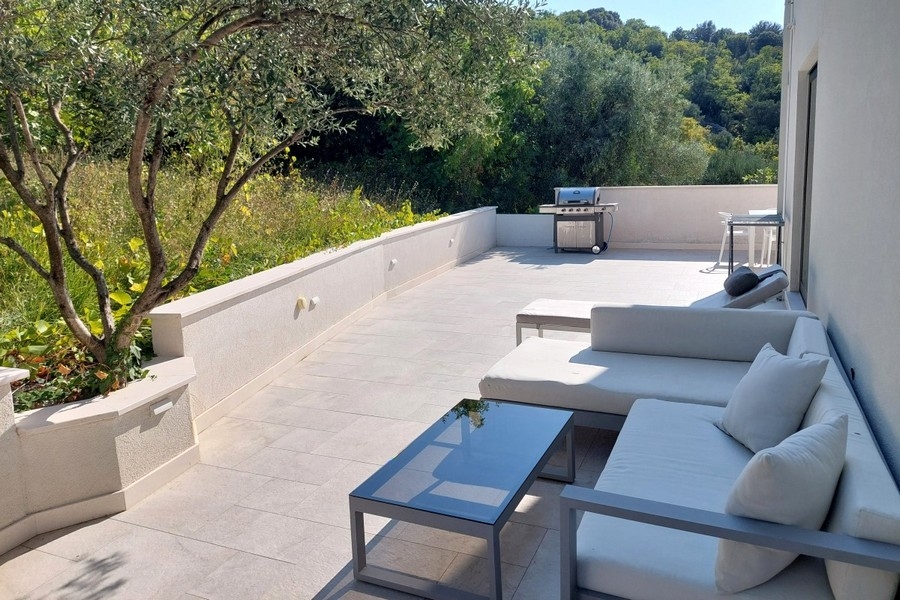 Sun terrace with lounge and grill