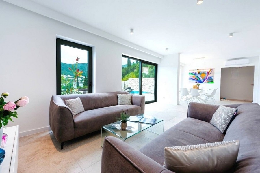 Bright living area with large window fronts
