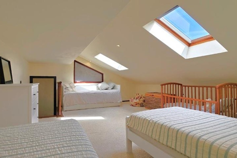 Attic room with skylights