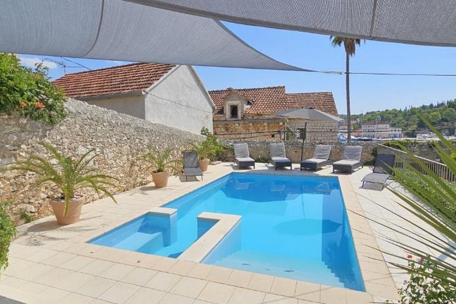 Swimming pool with sun terrace