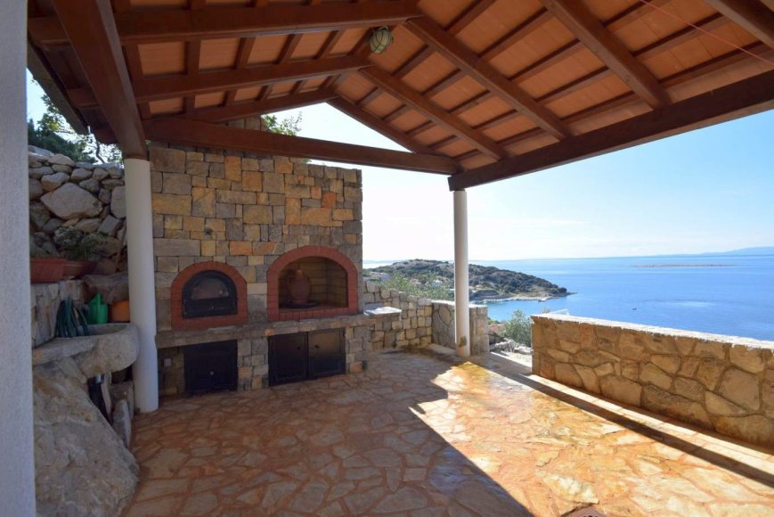 Large terrace with sea views and stone ovens.