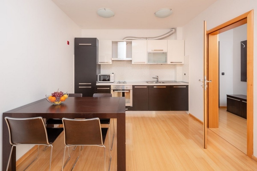 Kitchen with dining table in the apartment house