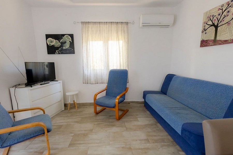 Living room with sofa and seating area in Croatia