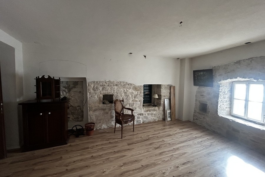 Living room with stone wall in Croatia