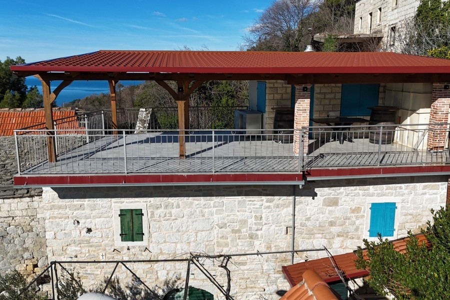 Stone house with covered terrace