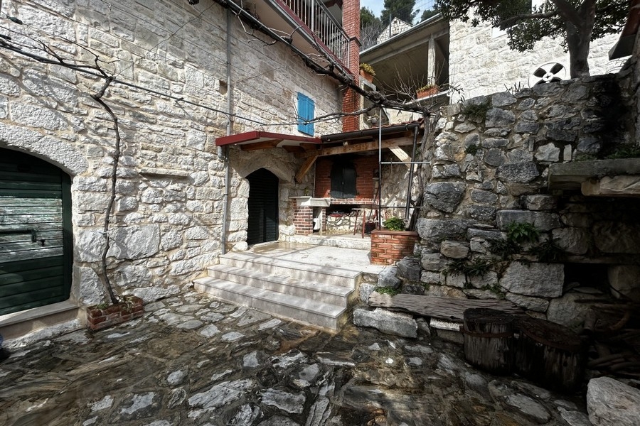 Courtyard with outdoor fireplace