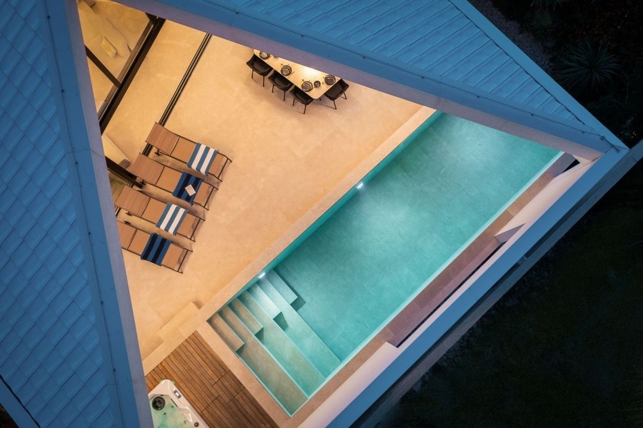Bird's eye view of pool and sun loungers