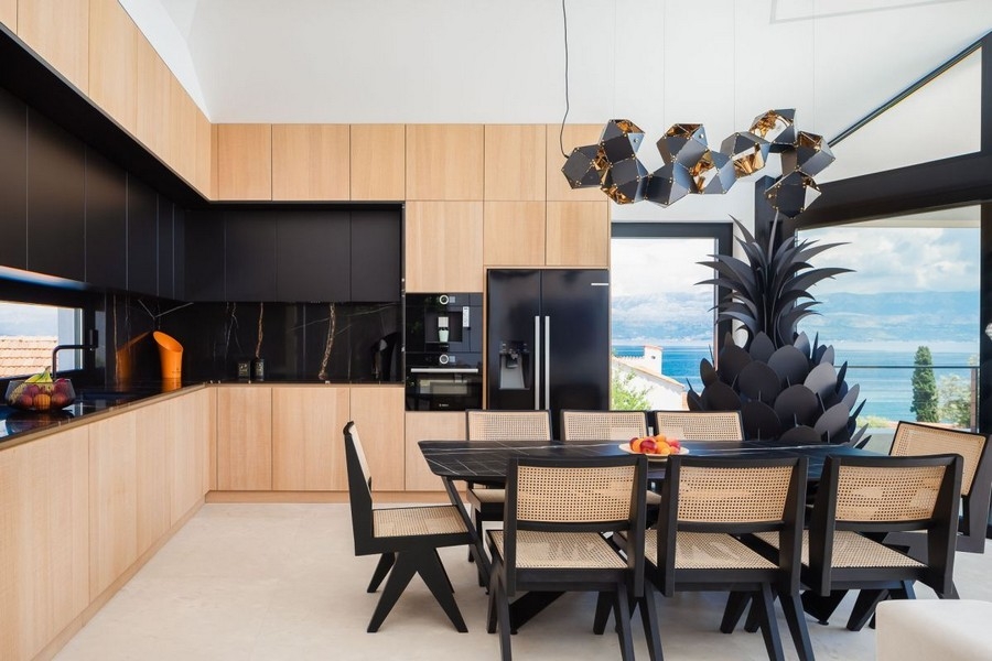 Modern kitchen with island and sea views