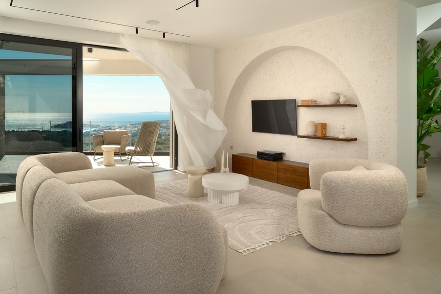 Living room with sofas and sea views